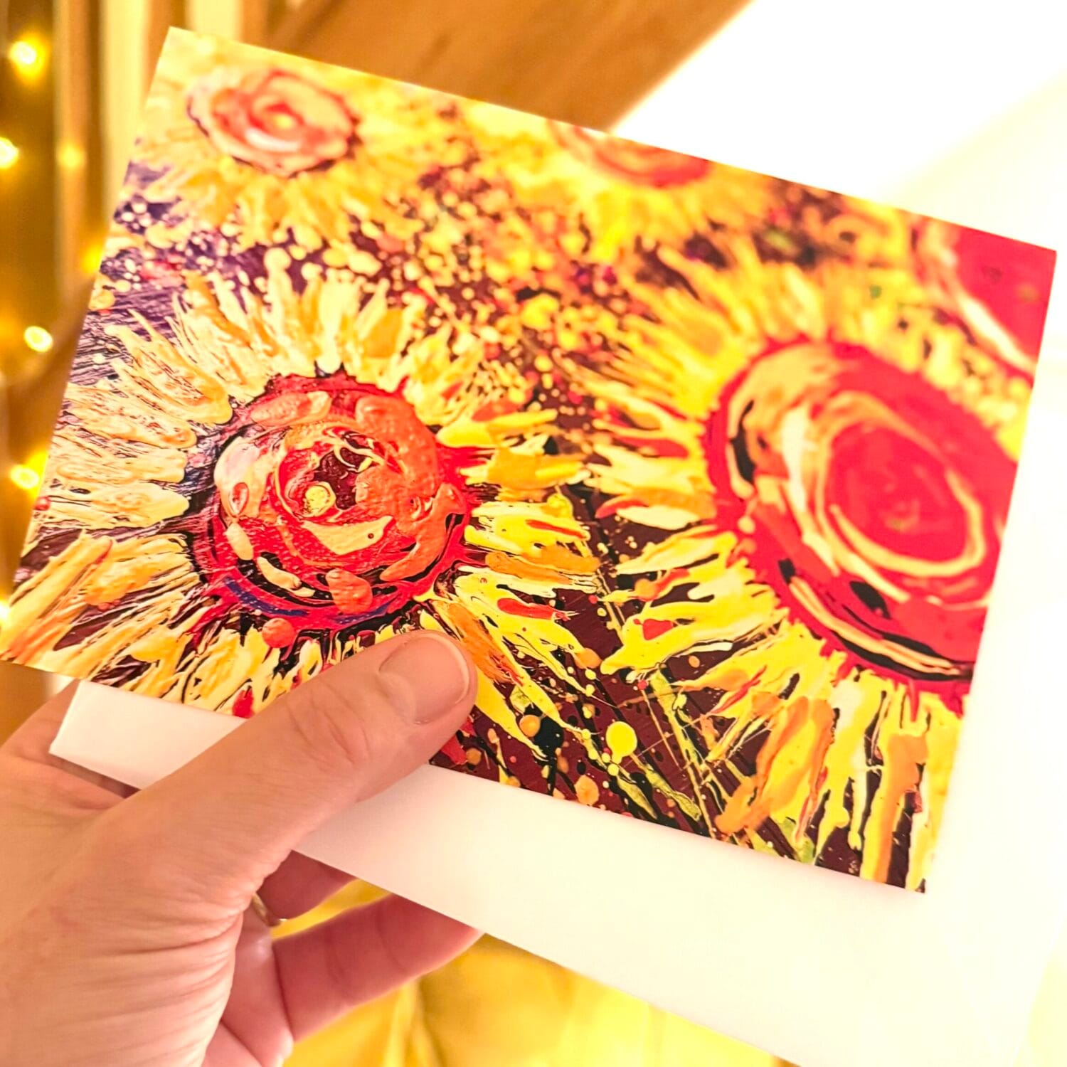 Sunflower Joy Greetings Card Shown Held In Hand With Envelope