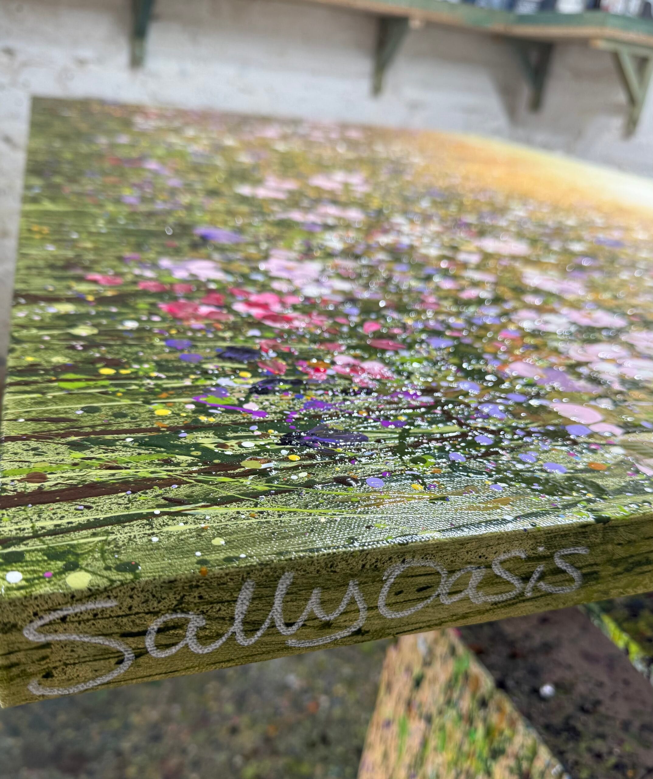 Soft Pink Wild Flower Meadow Detail artist’s signature Detail of Soft Pink Wild Flower Meadow oil painting showing textured floral brushwork and canvas edge